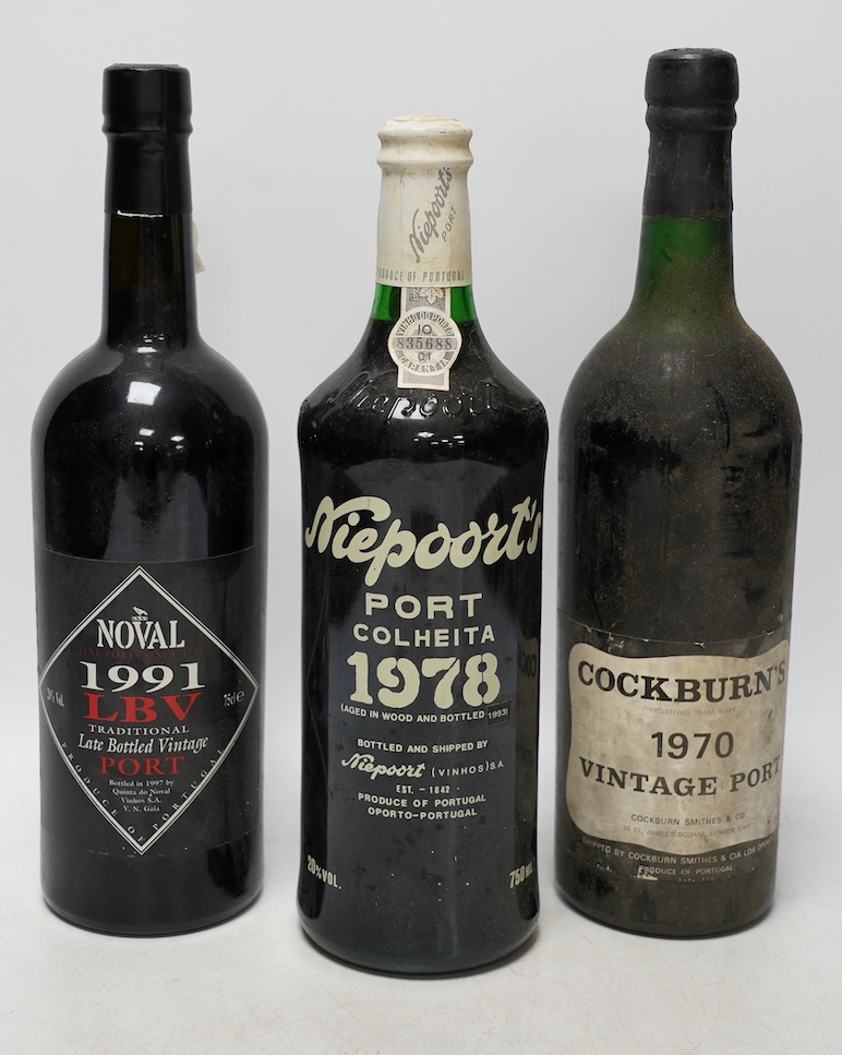 Three bottles of port to include a bottle of Niepoort’s Colheita port vintage 1978, a bottle of Noval 1991 LBV port and a bottle of Cockburns 1970 vintage port. Condition - fair, storage history unknown